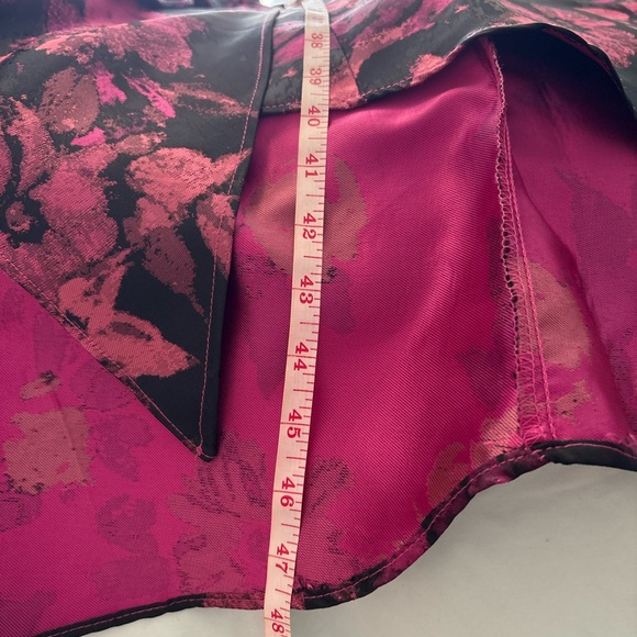 High/low black top with black and pink patterned skirt attached. - Picture 3 of 9